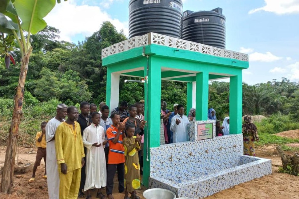 COMMUNITY HAND PUMP AND BOREHOLE WATER WELL WITH SOLAR PANEL